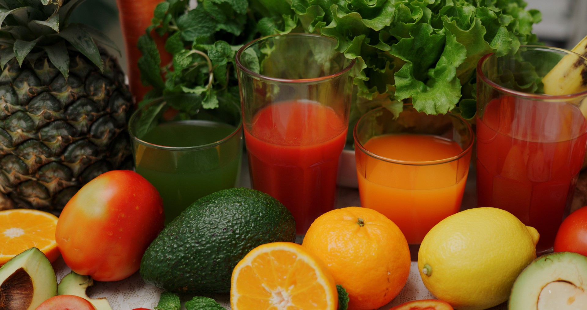 Healthy vegetables, fruits and juices are arranged on a wooden table. Healthy food, Super food